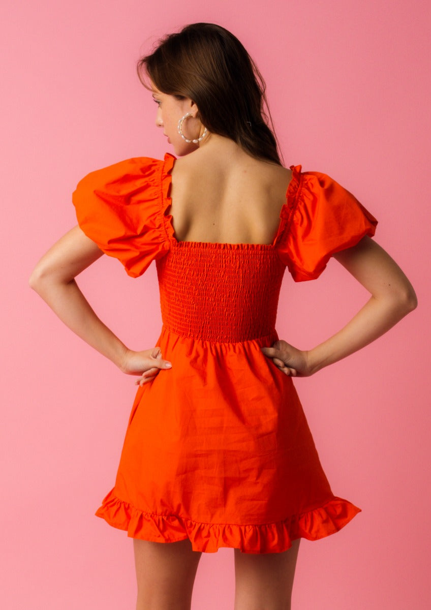 The ‘Fia Smocked Mini Dress’