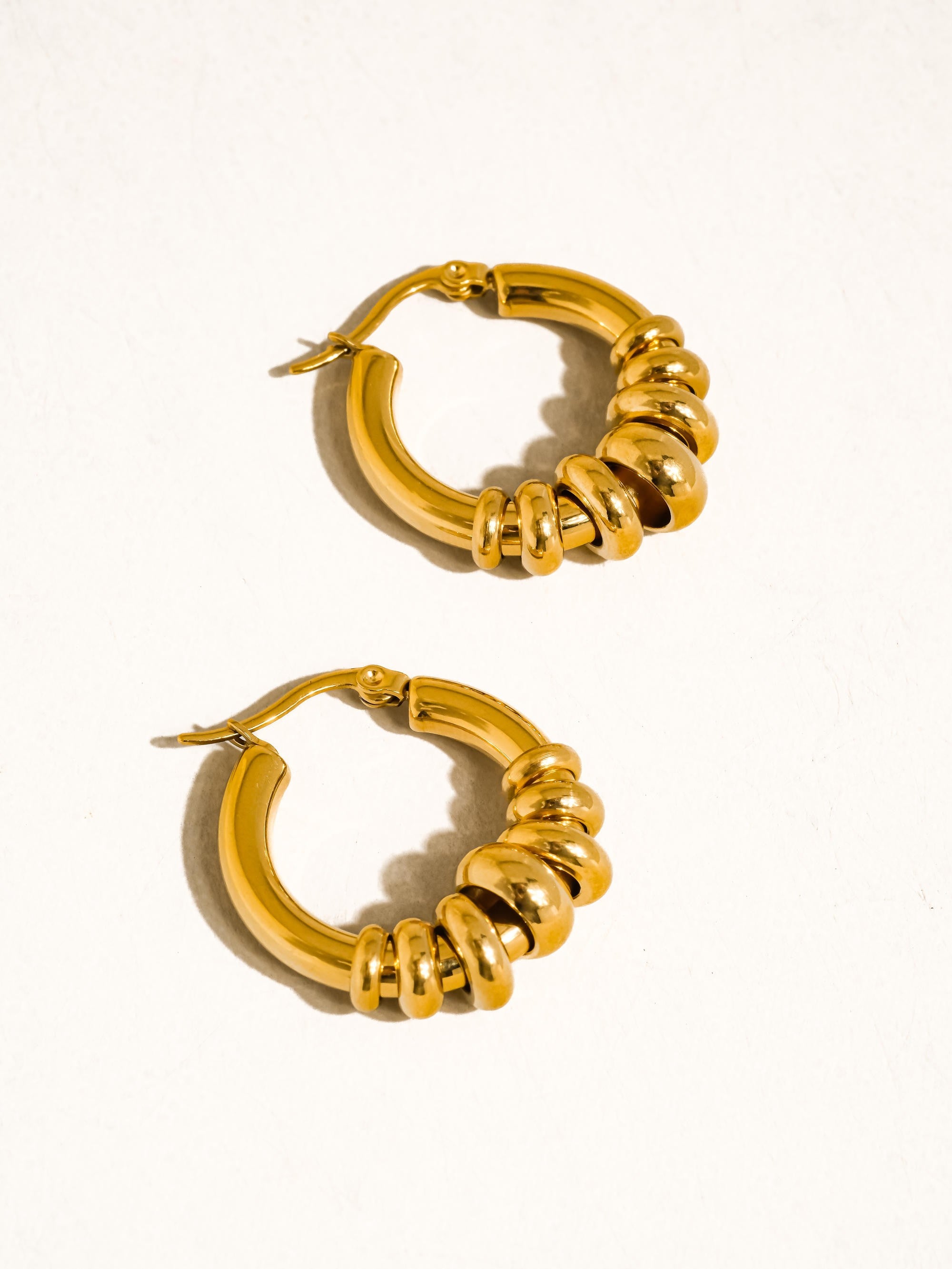 The ‘Novine Two Tone Hoop Earrings’