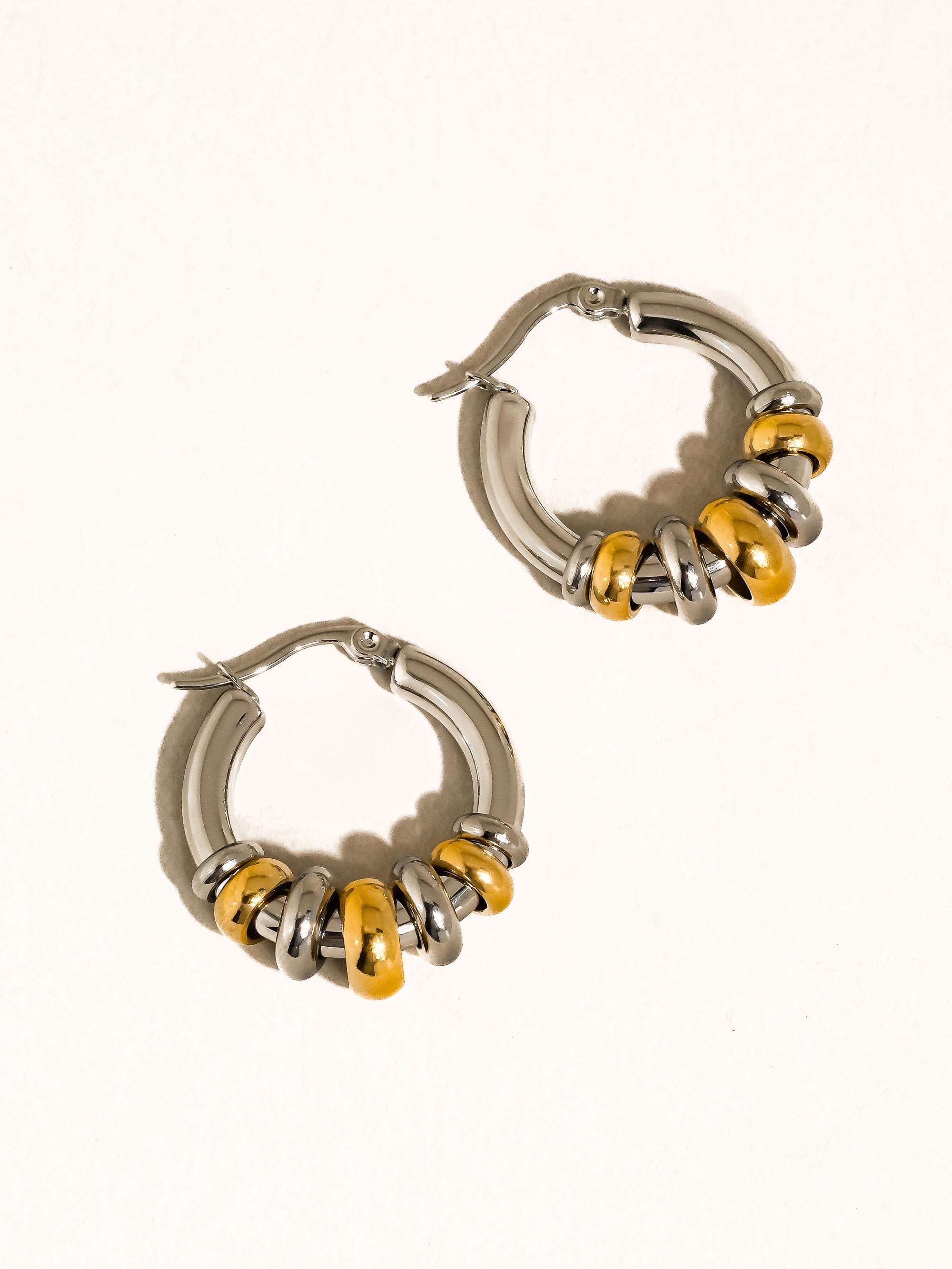 The ‘Novine Two Tone Hoop Earrings’